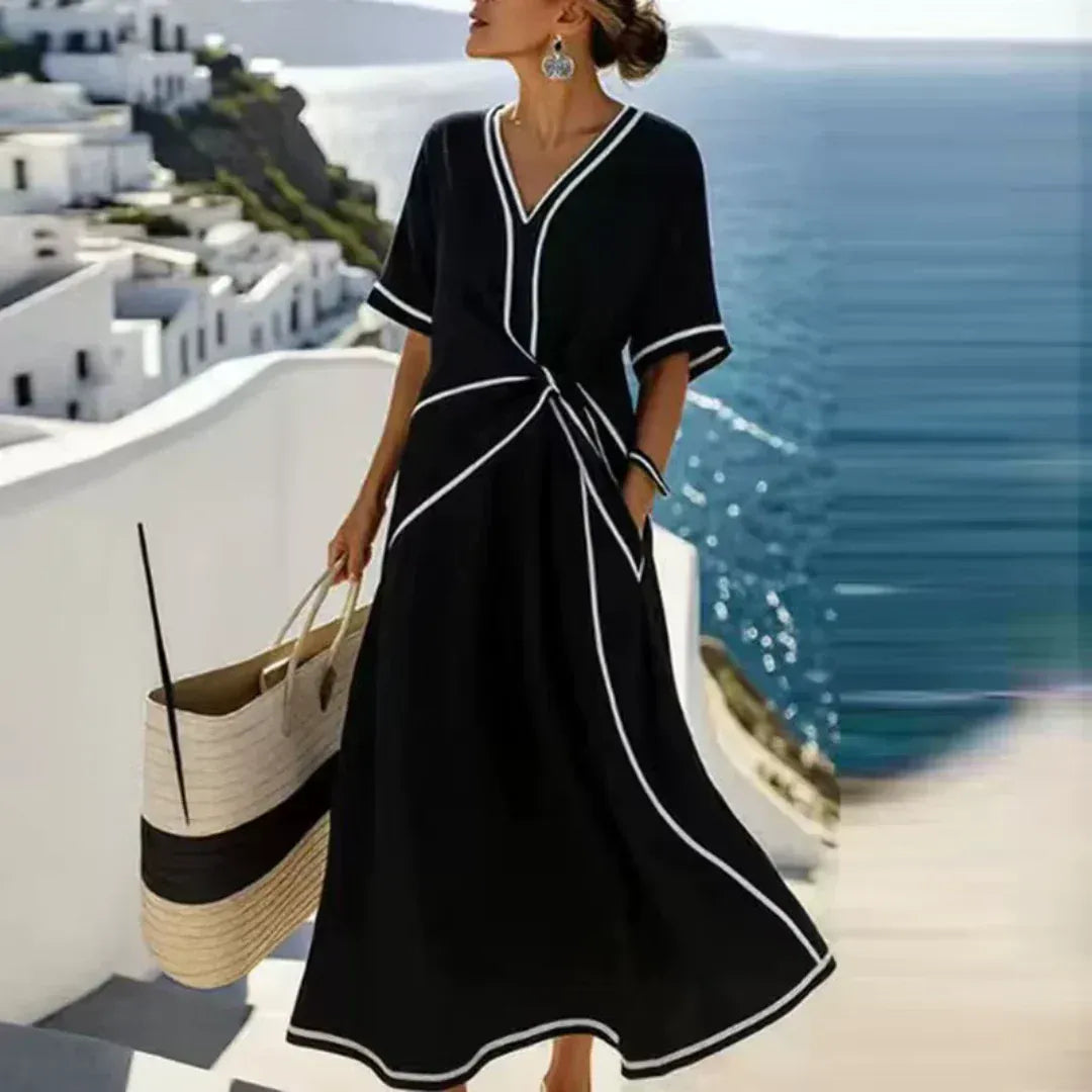 Amelia | Elegante vestido con escote en V y corte que realza la figura.