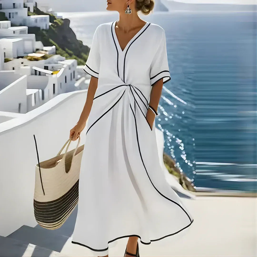 Amelia | Elegante vestido con escote en V y corte que realza la figura.